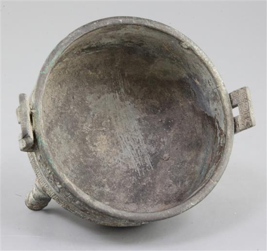 A Chinese archaic bronze tripod food vessel, Ding, probably Warring States period, 5th-2nd century B.C., 14.5cm, 9.5cm high, repair